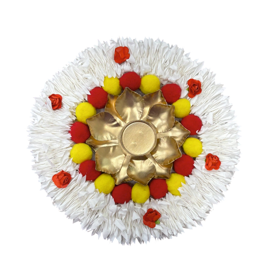 Decorative item with gold center, red and yellow accents on a white background