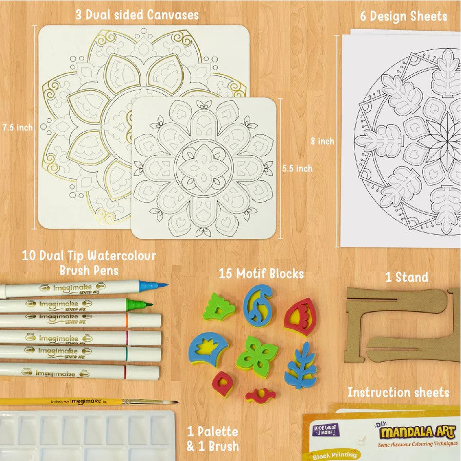 Mandala art kit with canvases, brush pens, and other supplies on a wooden surface