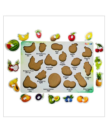 Todfod wooden fruit puzzle board with removable pieces showing fruits like banana, strawberry, kiwi, apple, cherry, dragon fruit, avocado, plum, lemon, blueberry, mango, papaya, watermelon, orange, grapes, and pineapple labeled in English and Hindi.