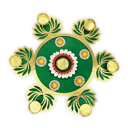 Decorative green and gold pattern on a white background