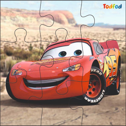 Jigsaw puzzle of a red race car with a desert background, brand 'Todfod' visible.