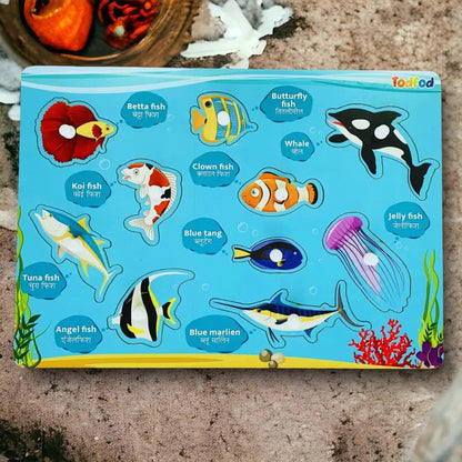 Children's educational puzzle with fish illustrations on a blue background