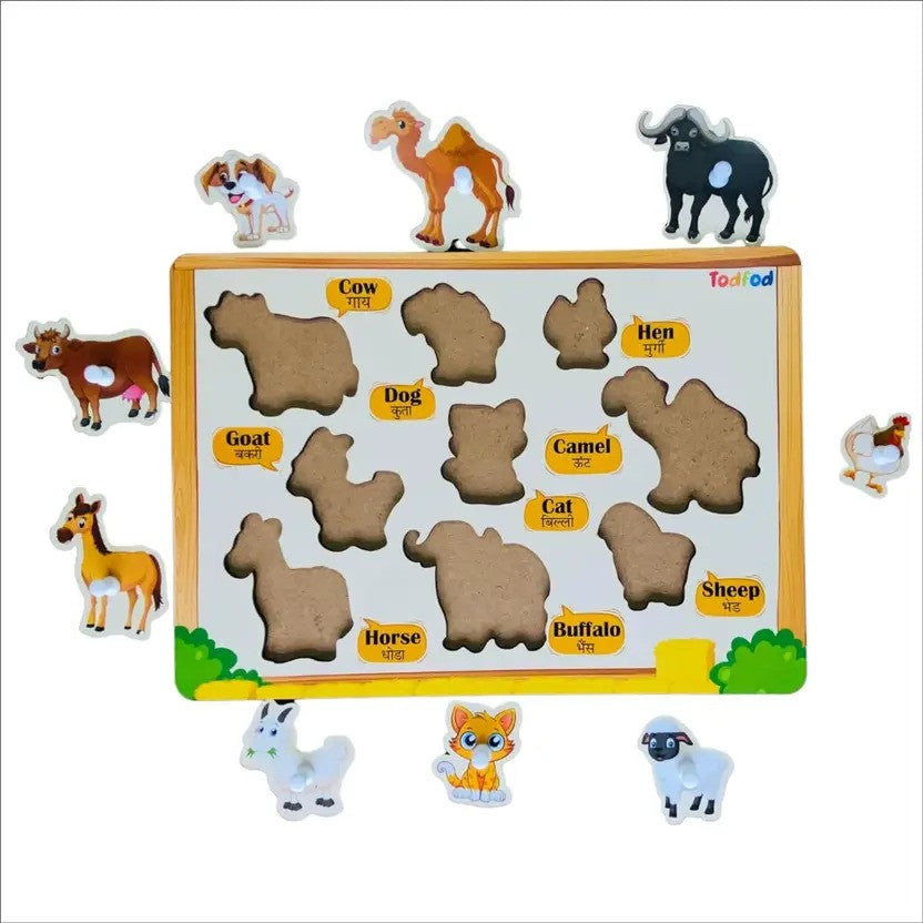 Children's animal puzzle with wooden board and cardboard animal shapes on a white background