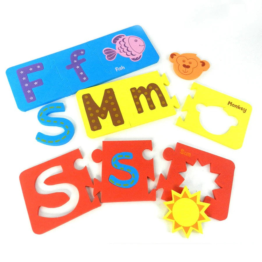 Colorful alphabet and shape puzzle pieces on a white background