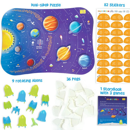 Solar system-themed educational toy set with puzzle, stickers, alien figures, pegs, and storybook.