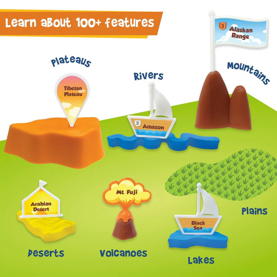 Educational toy set with various landforms and features labeled on a green base.