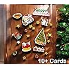 Set of greeting cards with various designs on a wooden board