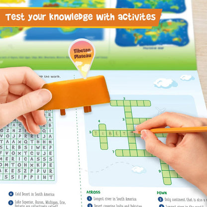 Educational activity book with a map and crossword puzzle, featuring hands using a tool to interact with the content.