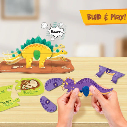 Dinosaur-themed building and play set with hands interacting with the pieces on a wooden surface.