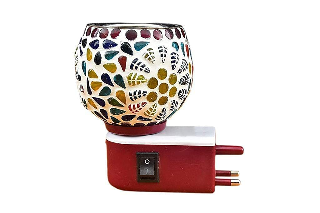 Decorative wax warmer with colorful mosaic design on a white background