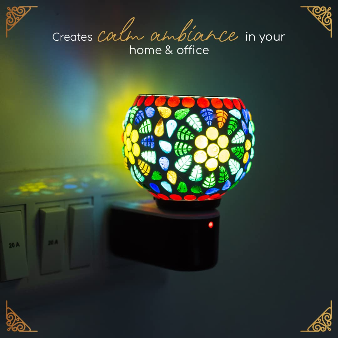 Colorful mosaic lamp with decorative text on a dark background