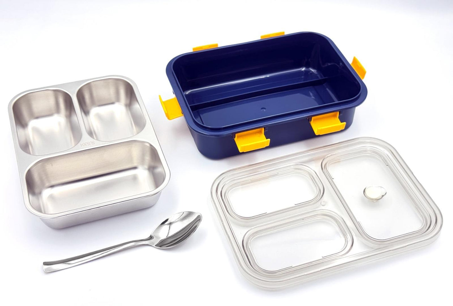 Set of stainless steel bento boxes with compartments on a white background