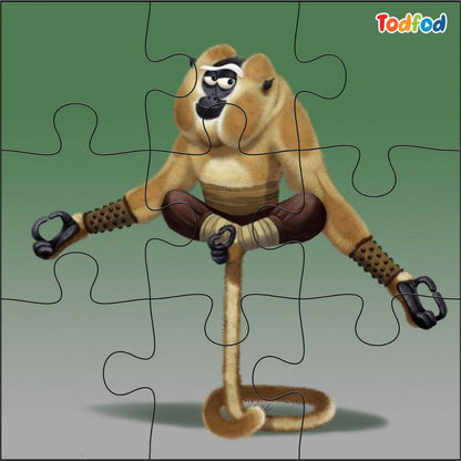Jigsaw puzzle with a monkey character on a green background, featuring the Todfod brand.