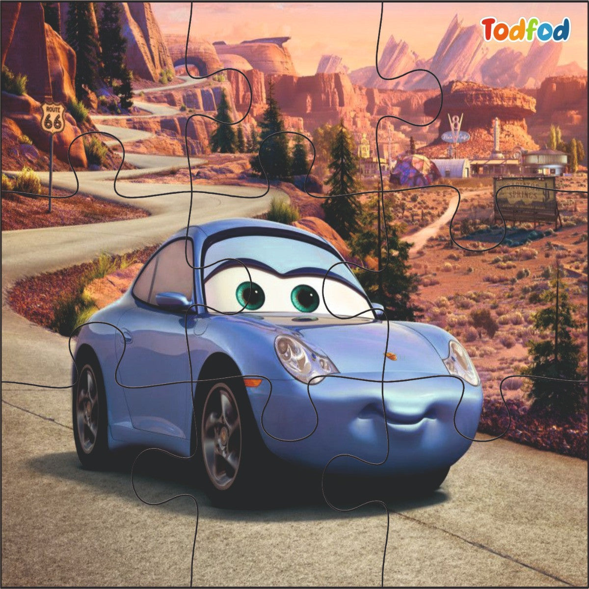 Puzzle of a blue car with a desert landscape background, featuring the brand 'Todfod'.