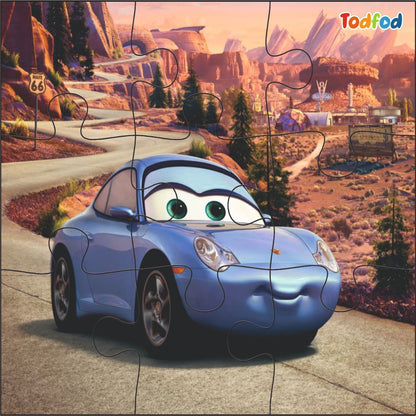 Puzzle of a blue car with a desert landscape background, featuring the brand 'Todfod'.