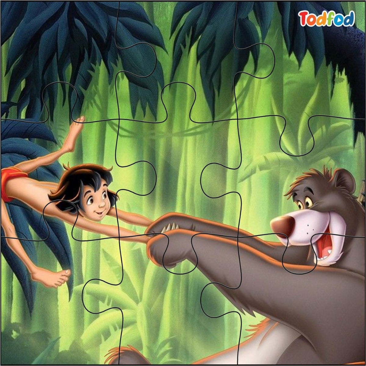 Jigsaw puzzle with characters from 'The Jungle Book' in a jungle setting, featuring Baloo and Mowgli.
