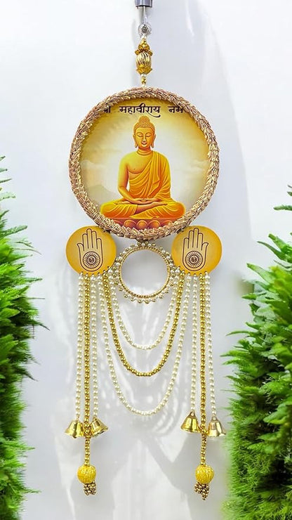 Decorative hanging with Buddha image and bells against a white background