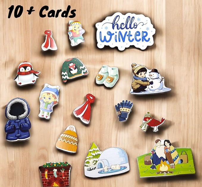 Collection of winter-themed cards and magnets on a wooden surface with 'hello Winter' text.