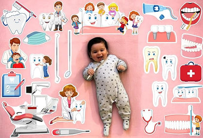 Baby lying on a pink background with dental-themed illustrations