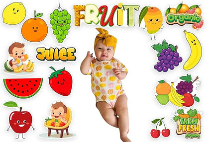 Baby in a yellow outfit surrounded by cartoon fruits and 'Fruit Organic' text