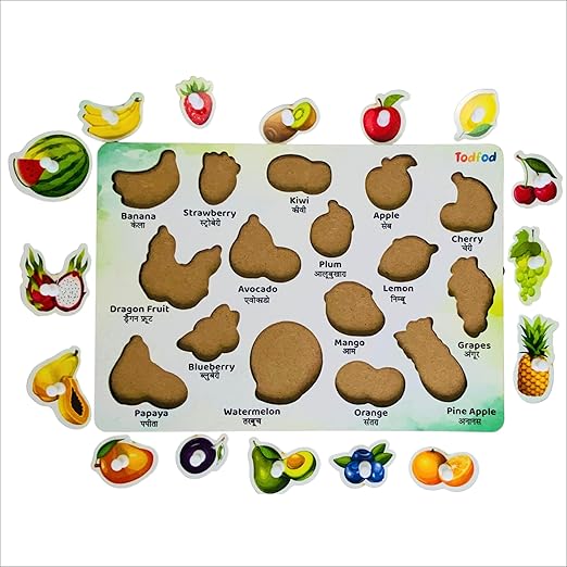 Set of colorful fruit-shaped magnetic letters on a white background