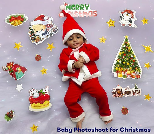 Child in Santa Claus outfit with Christmas-themed decorations on a gray background