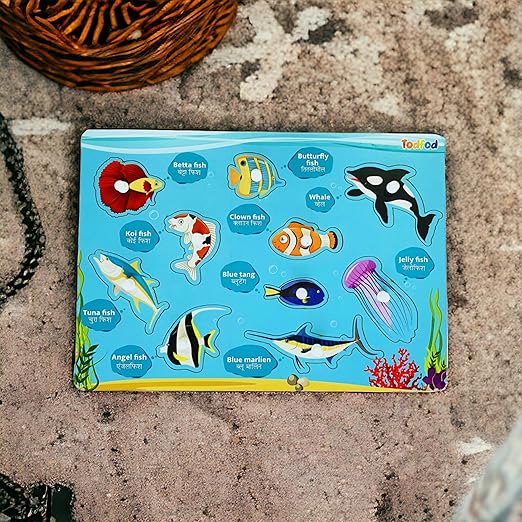 Children's educational puzzle with fish illustrations on a textured surface