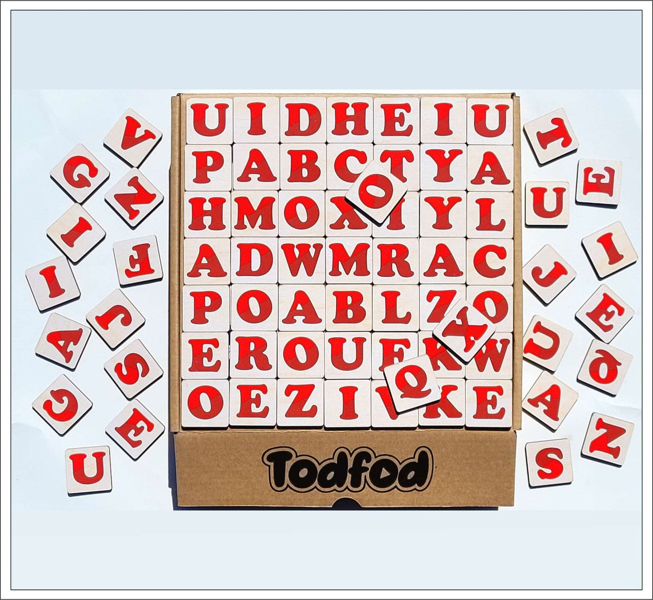 Wooden letter blocks with red and white letters, featuring the brand 'Todfod'.