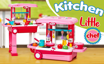 Toy kitchen set with pink and red colors on a wooden surface.