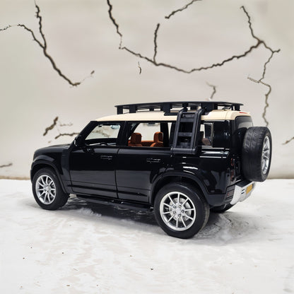 Black SUV model with open doors on a white surface with a map background