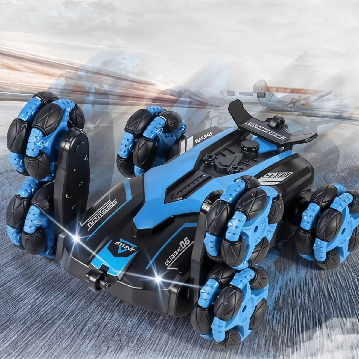 Blue and black remote control car on a reflective surface with blurred background
