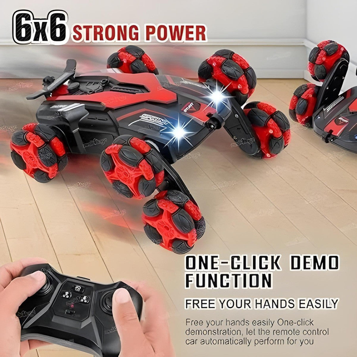 Toy car with red and black design on a wooden floor, controlled by a remote control.