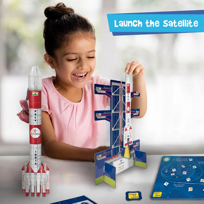 Child playing with a toy rocket and launch pad set, with text 'Launch the Satellite' above.