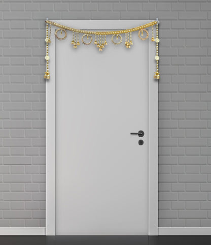 Decorative gold door arch on a gray brick wall