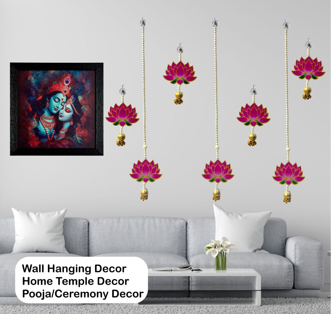 Wall hanging decor with lotus designs and a framed painting above a sofa.