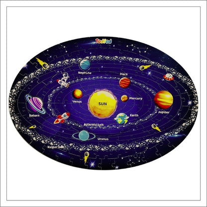 Solar system puzzle with colorful planets and stars on a dark background