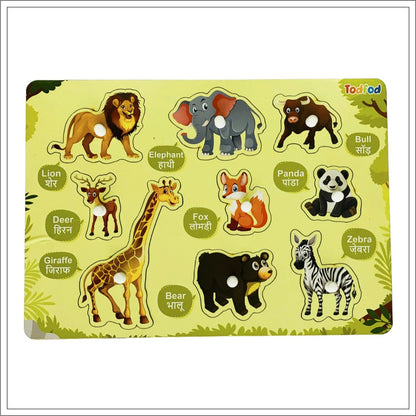 Children's puzzle with animal illustrations and labels on a green background